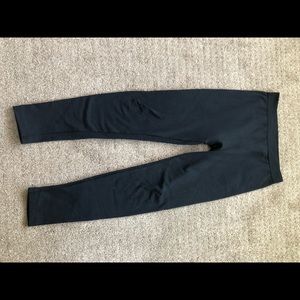 Woman’s black thick knit leggings